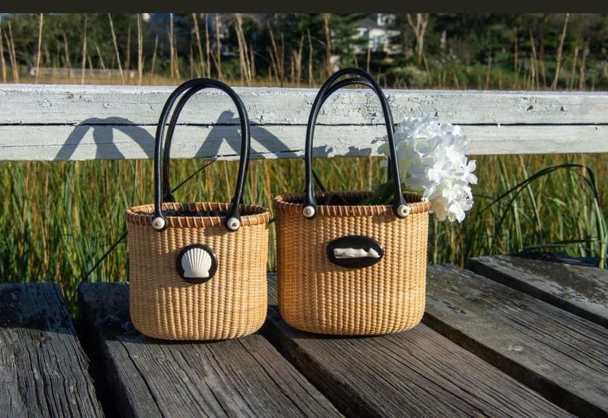 Chatham Weaves Nantucket baskets on a coastal boardwalk