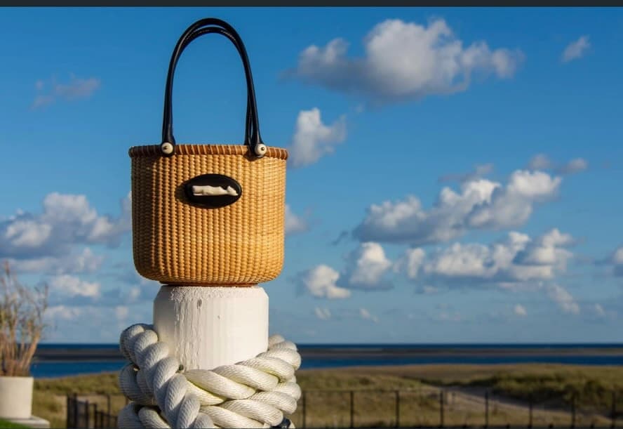 Chatham Weaves bucket bag with whale carving on Cape Cod
