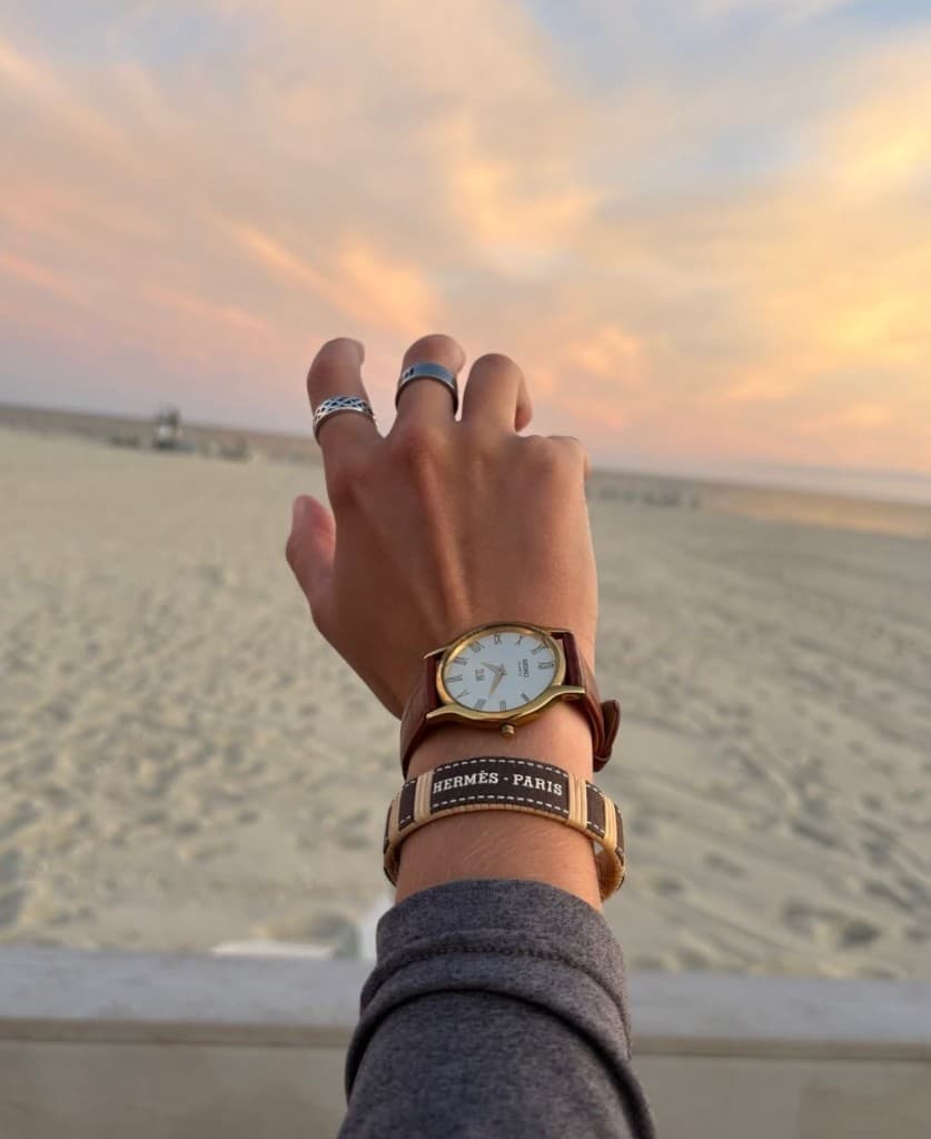 Nantucket weave bracelet with Hermès ribbon worn on the beach