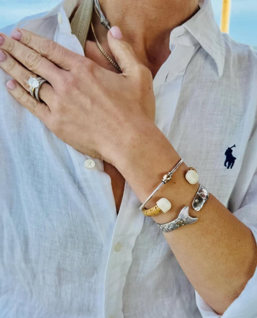 Nantucket weave bracelet with ivory end caps worn on the wrist