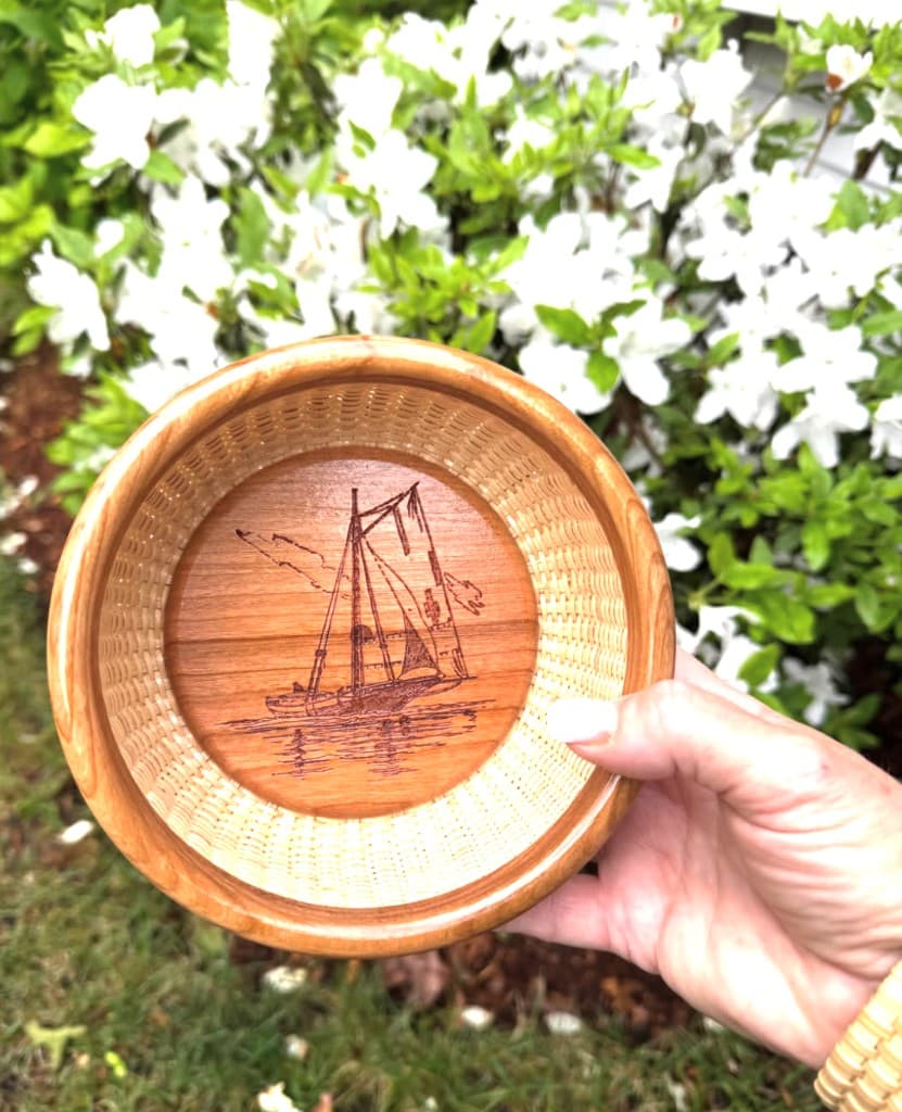 Nantucket basket with custom engraved sailboat base for Pleasant Bay Community Boating gala