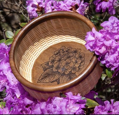 Nantucket lightship basket by Chatham Weaves among Cape Cod flowers